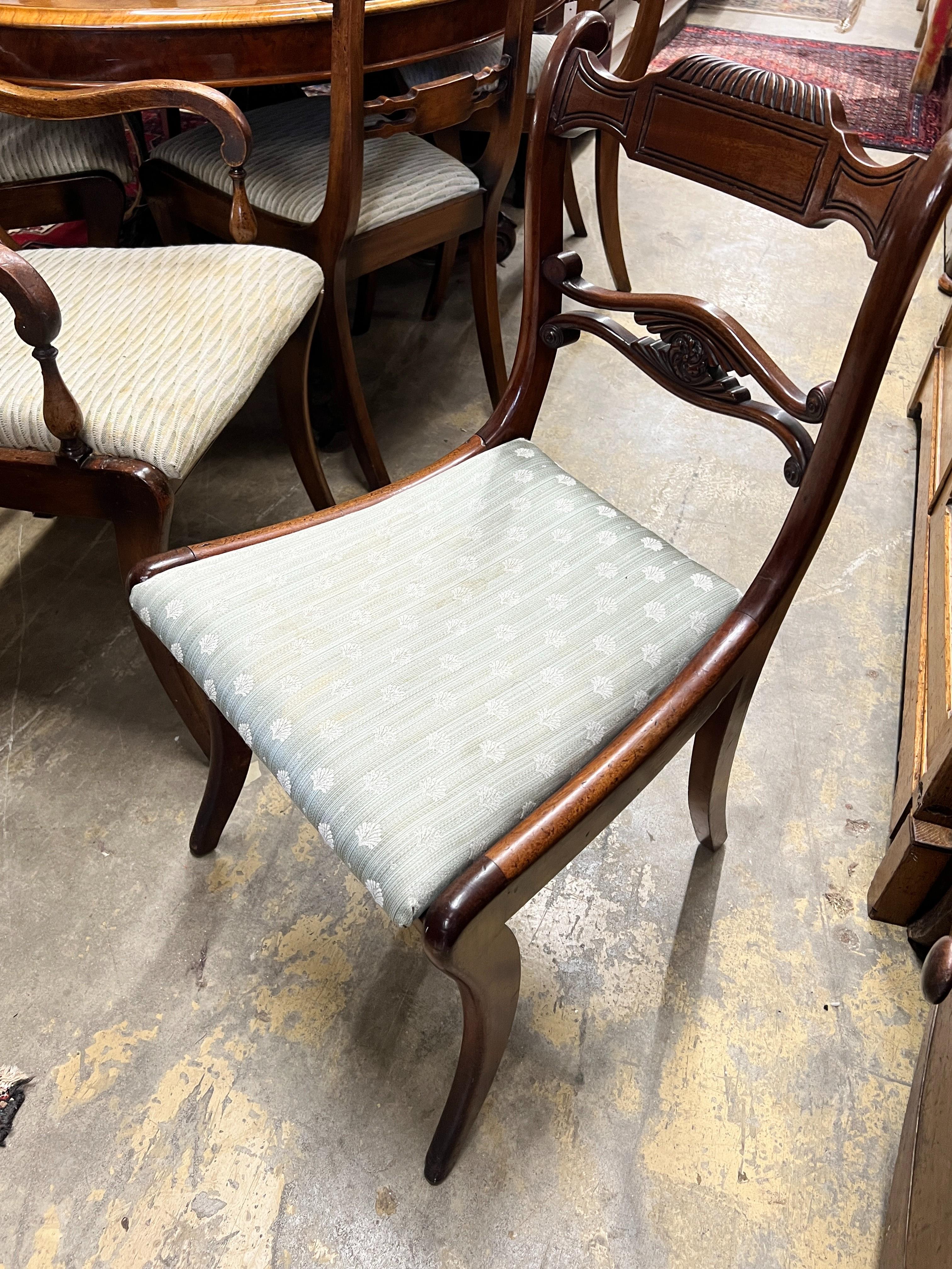 A set of four Regency mahogany dining chairs